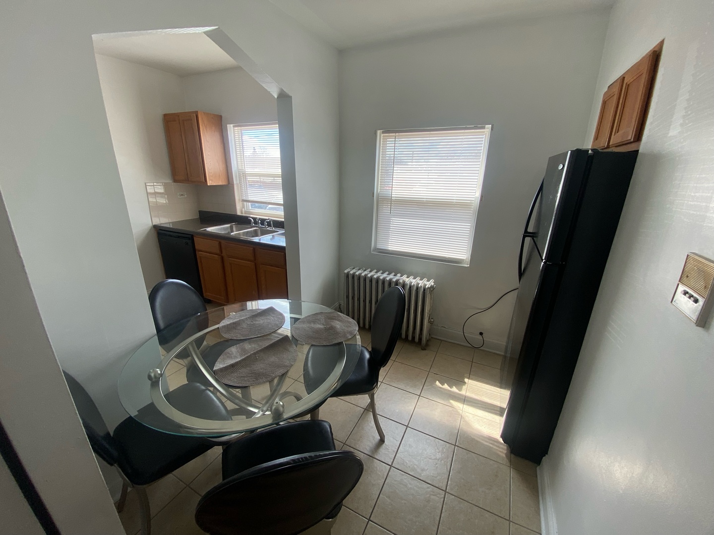 2419 North Oak Park Avenue, Unit 2C Chicago, IL 60707 - Photo 2 of 7 a view of entryway with furniture and windows
