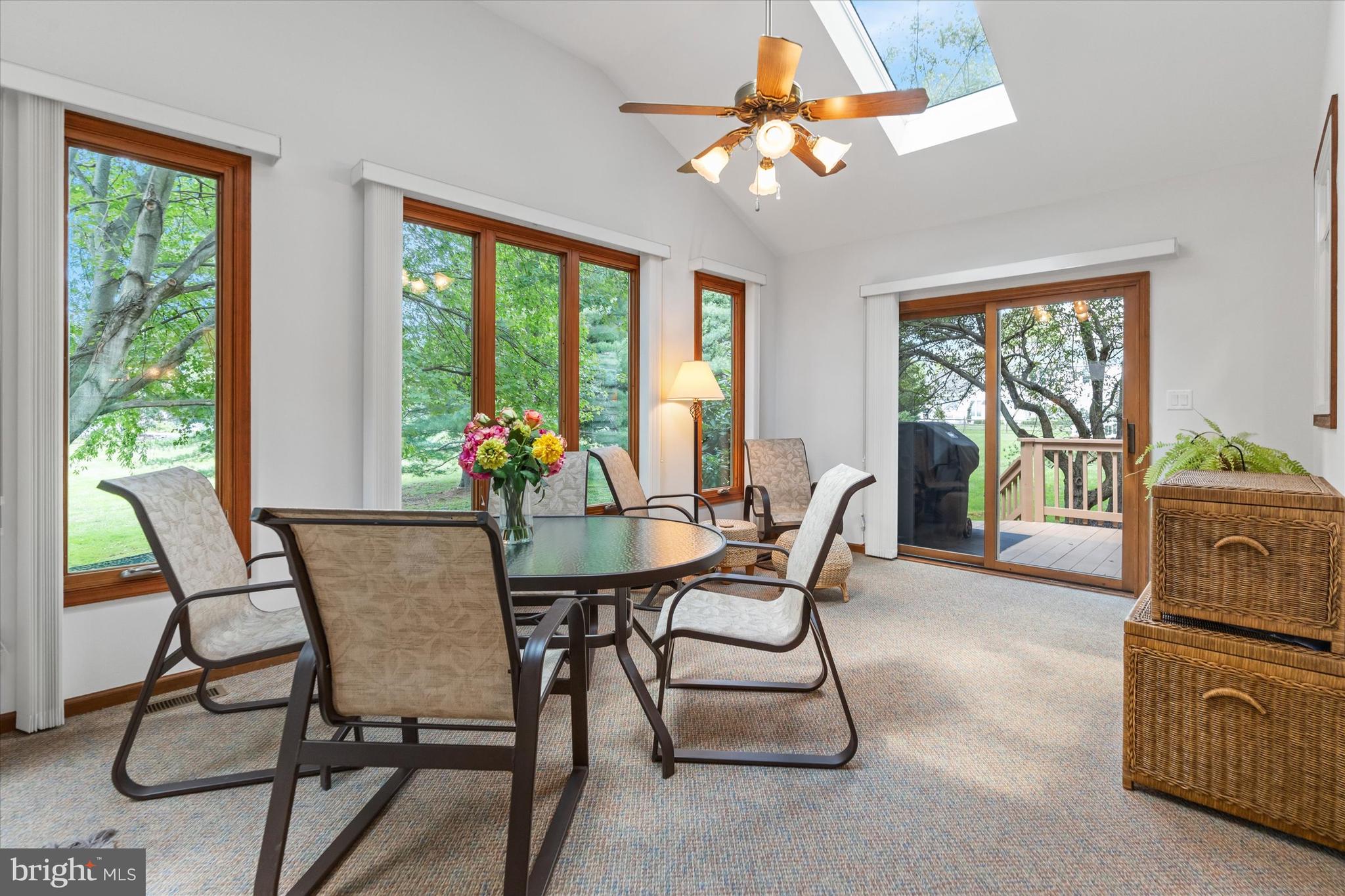 216 South Pond Road Hockessin, DE 19707 - Photo 21 of 61 a dining room with furniture a livingroom view and a potted plant
