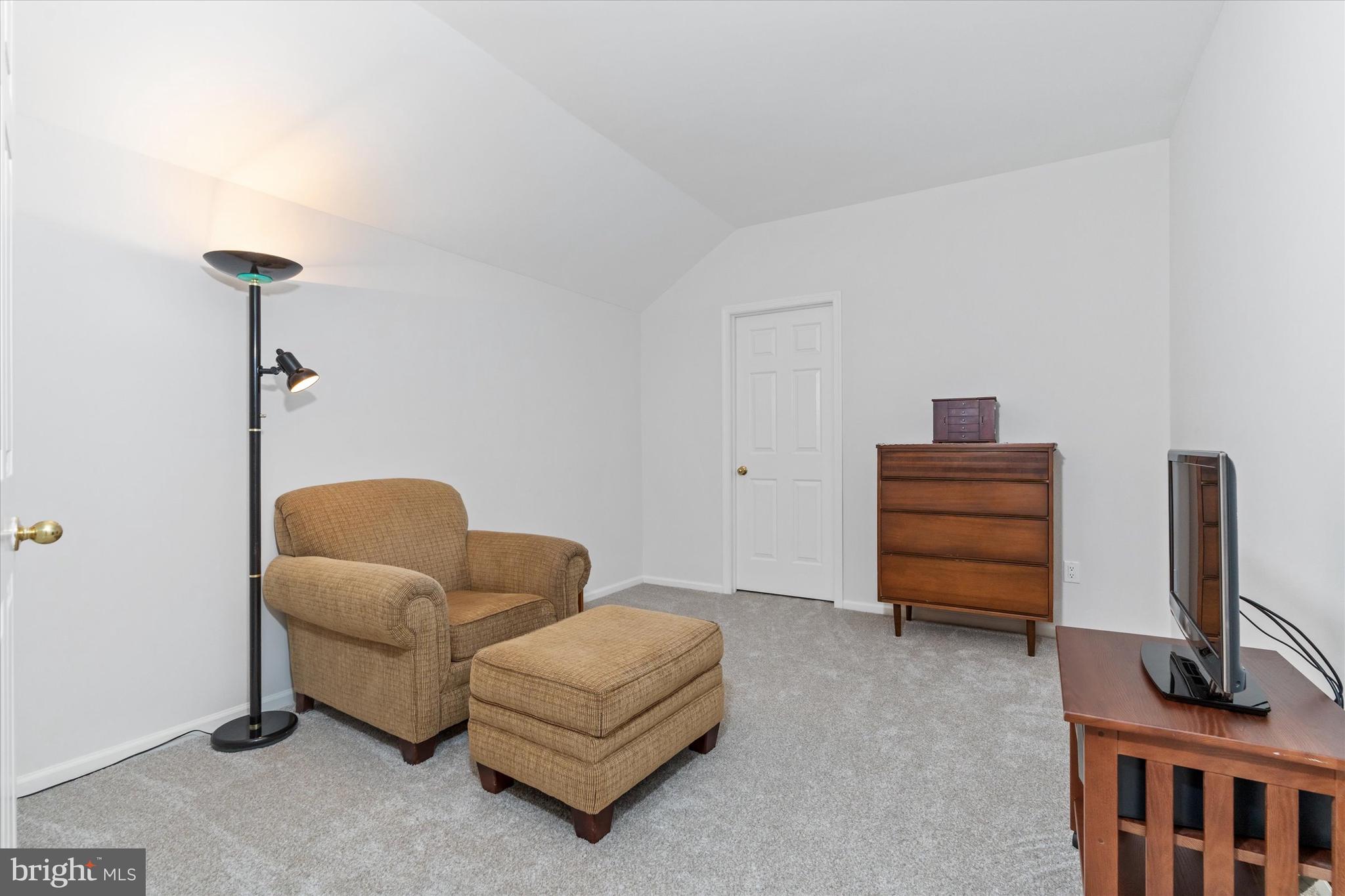 216 South Pond Road Hockessin, DE 19707 - Photo 31 of 61 a living room with furniture and a flat screen tv