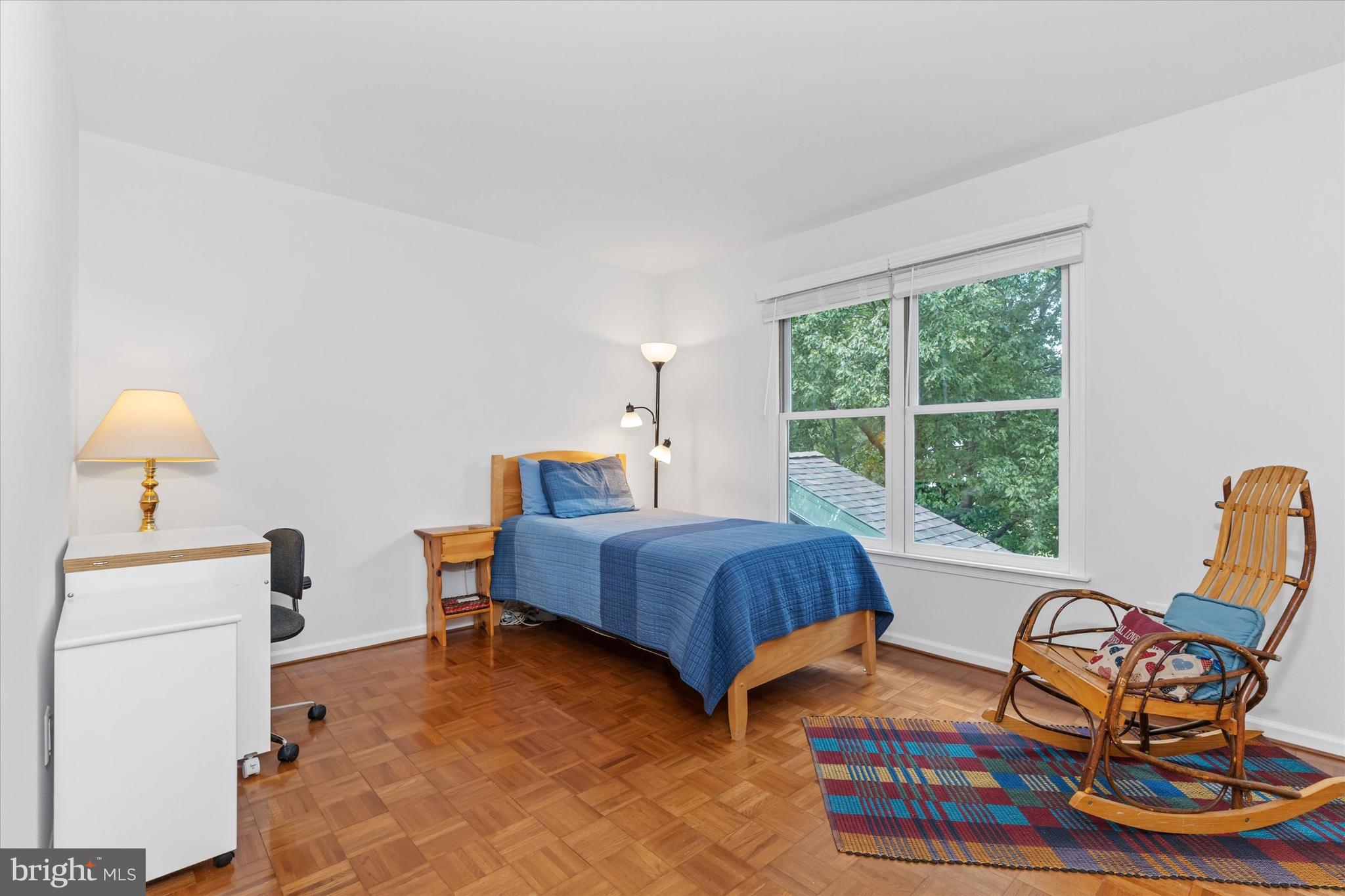 216 South Pond Road Hockessin, DE 19707 - Photo 40 of 61 a bedroom with a bed and wooden floor