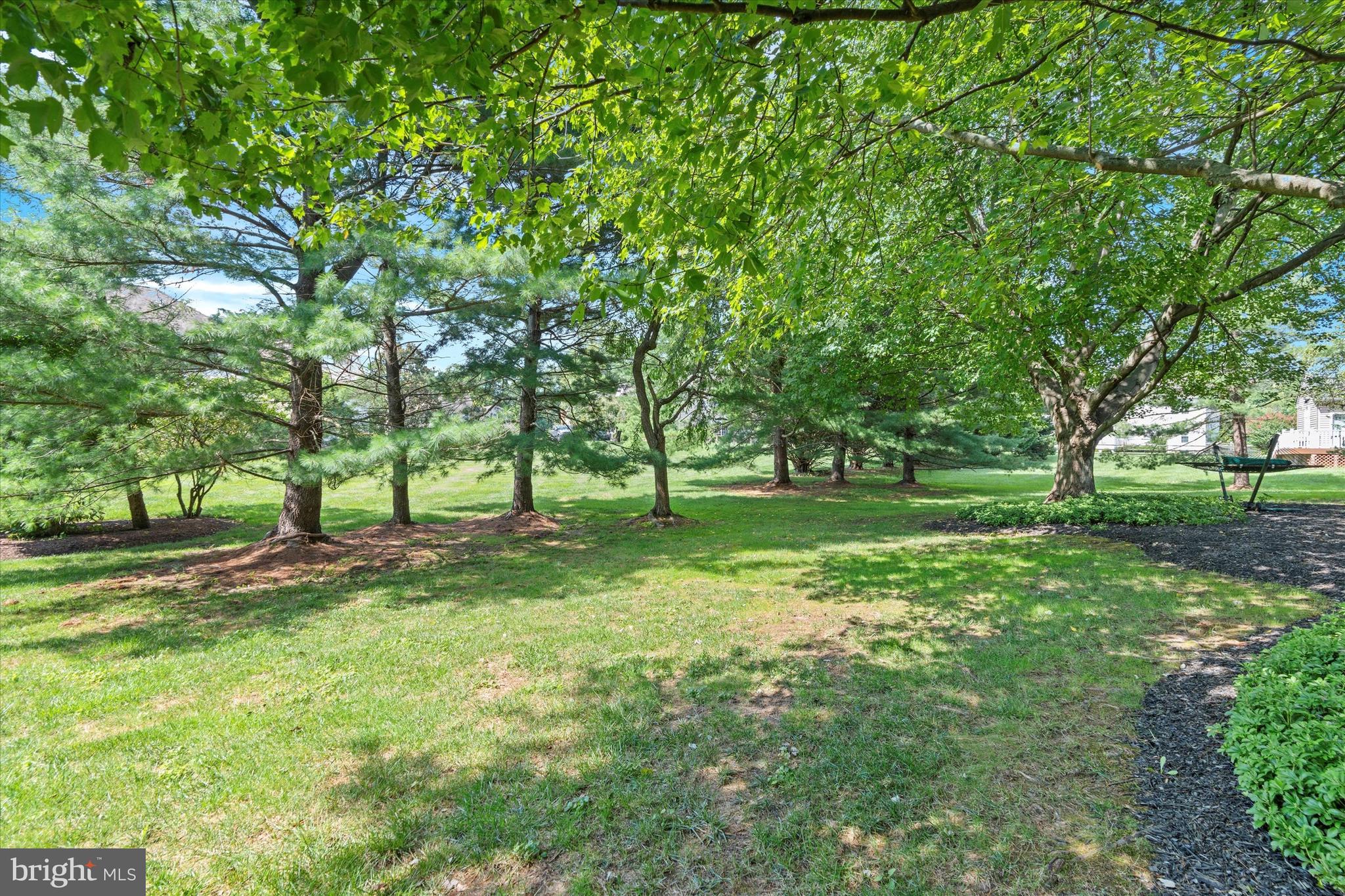 216 South Pond Road Hockessin, DE 19707 - Photo 48 of 61 a view of grassy field with benches