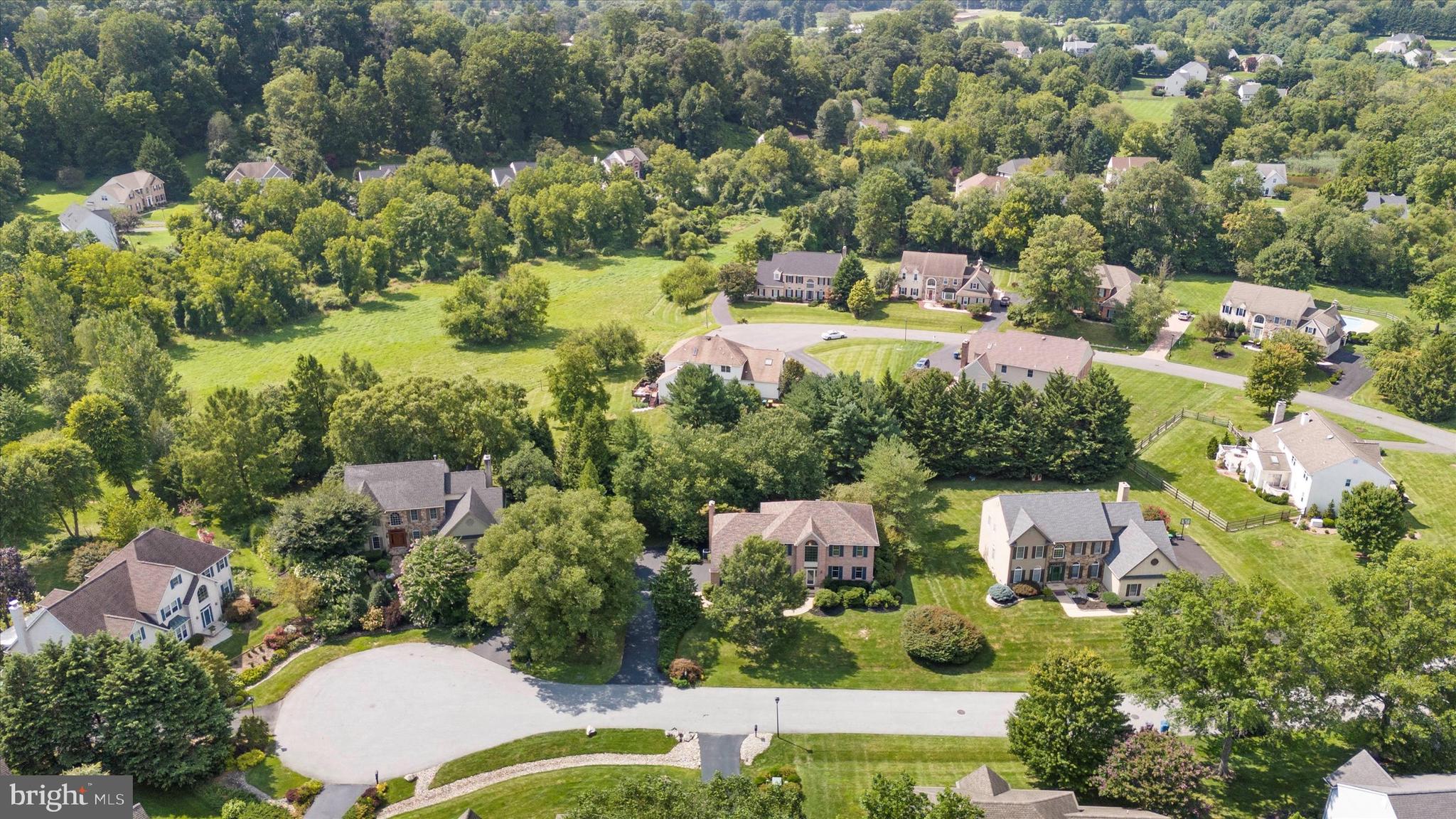 216 South Pond Road Hockessin, DE 19707 - Photo 51 of 61 an aerial view of residential houses with outdoor space and trees all around