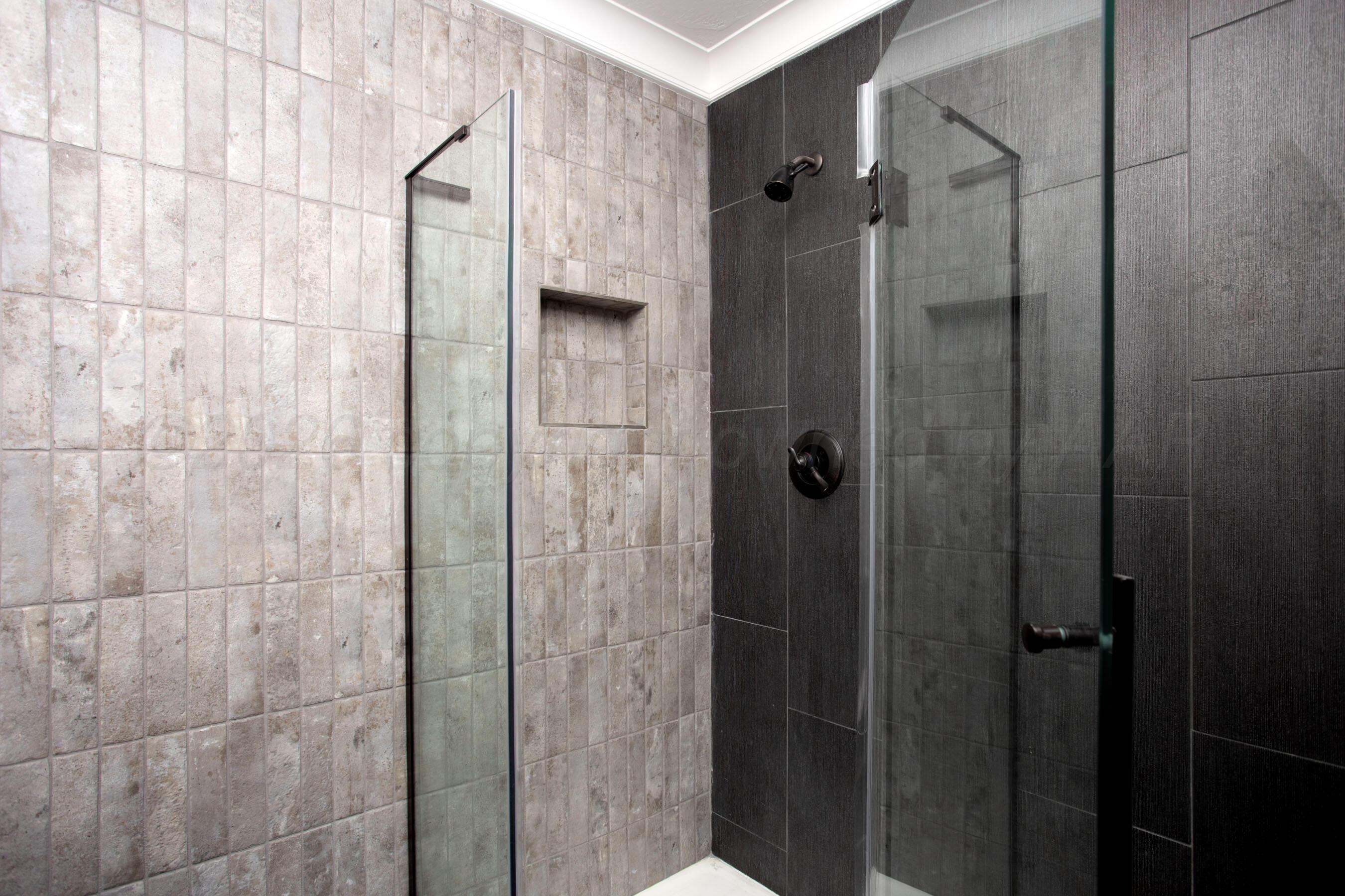4217 West Farmers Avenue Amarillo, TX 79110 - Photo 17 of 38 a bathroom with a shower and a sink