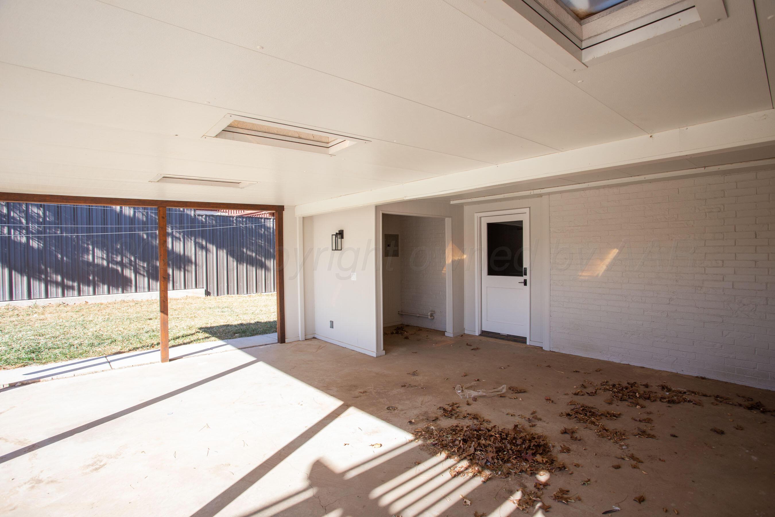 4217 West Farmers Avenue Amarillo, TX 79110 - Photo 38 of 38 a view of a porch with a backyard