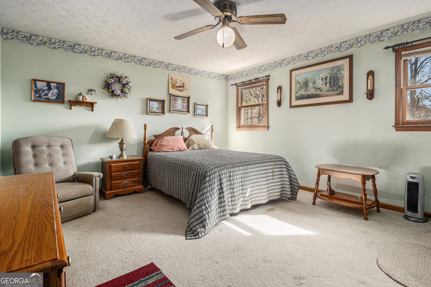 255 Barnett Road Hampton, GA 30228 - Photo 17 of 42 a bedroom with furniture and a window
