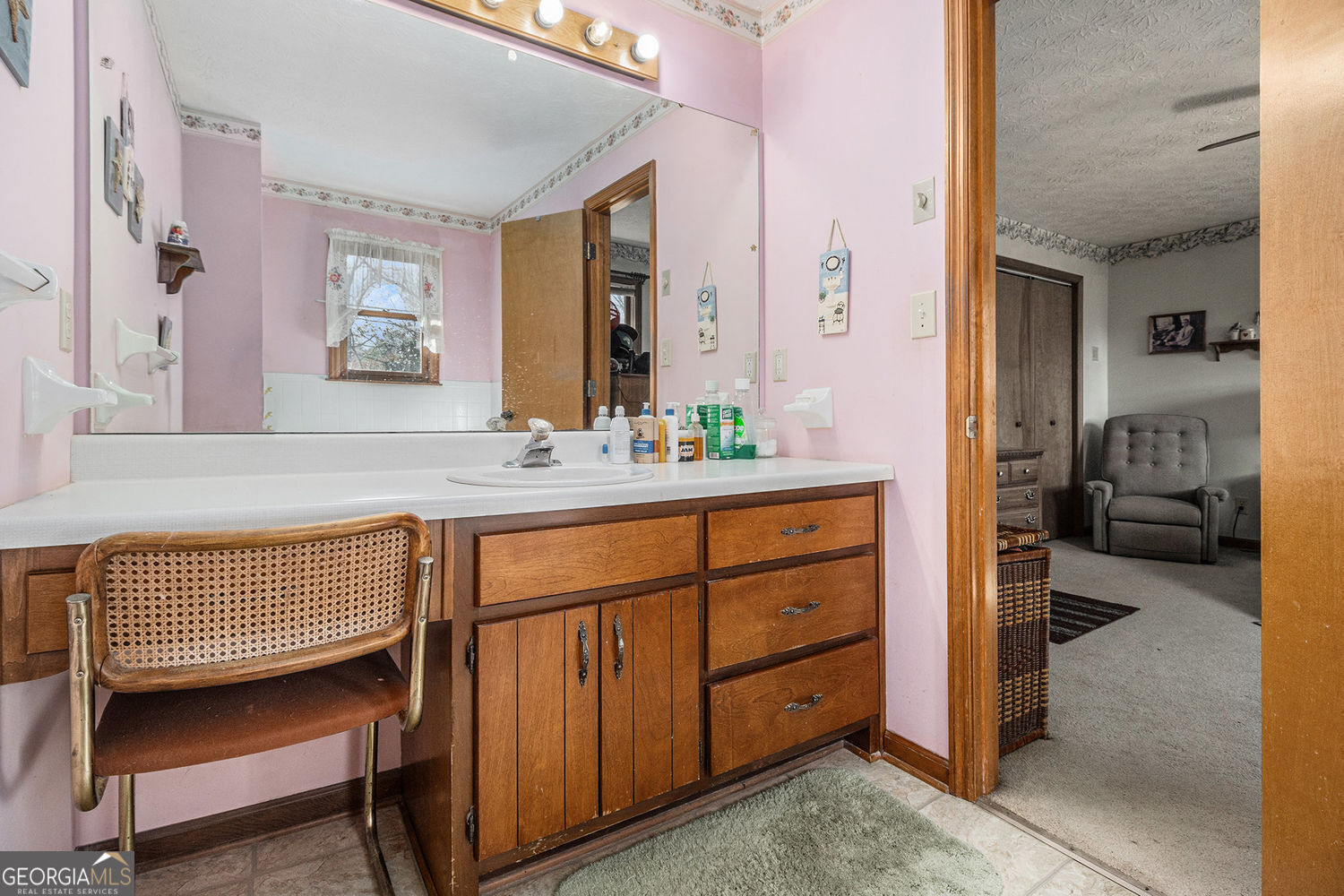 255 Barnett Road Hampton, GA 30228 - Photo 21 of 42 a en suite bathroom with a sink double vanity and a mirror