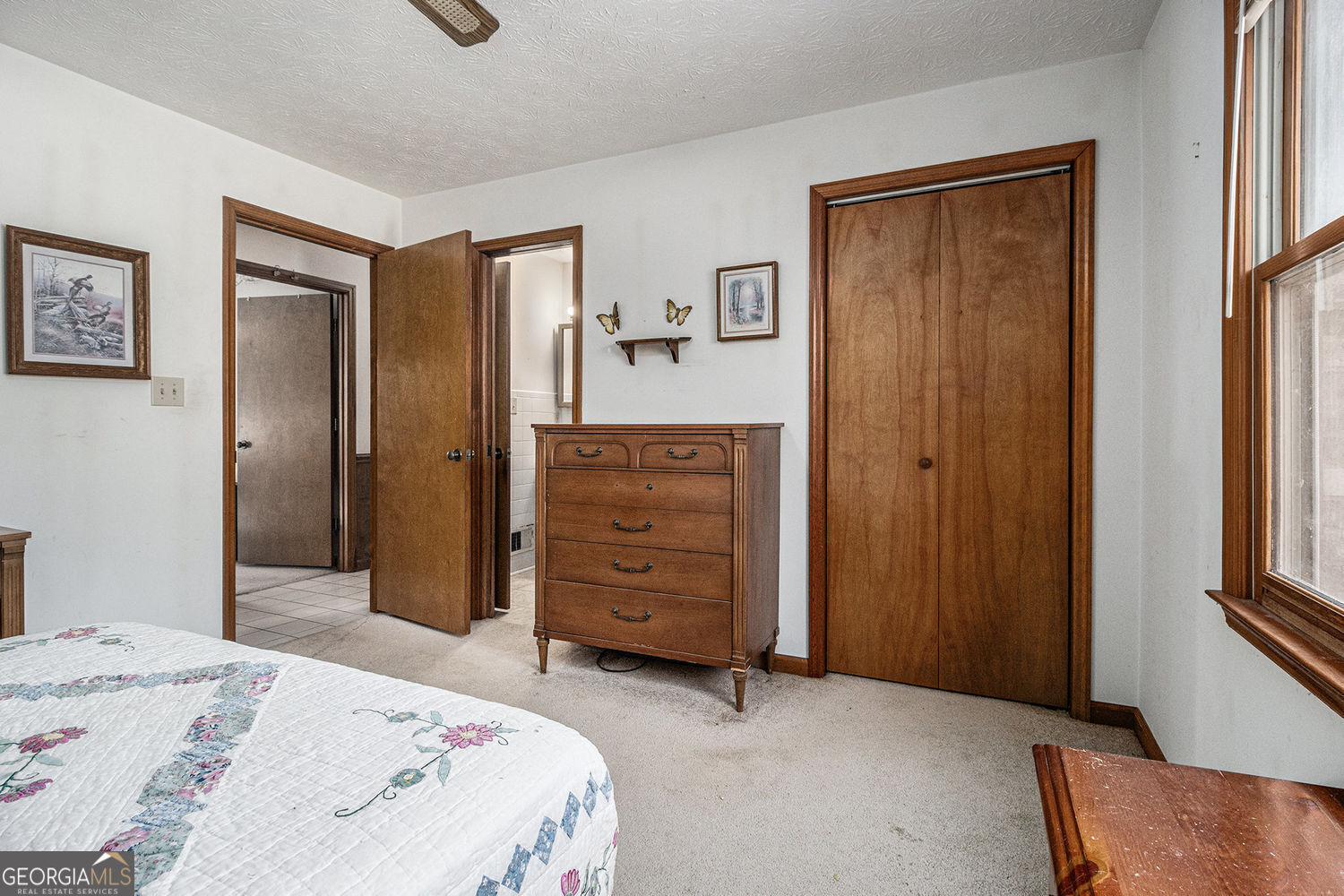 255 Barnett Road Hampton, GA 30228 - Photo 22 of 42 a bed room with a bed and a mirror