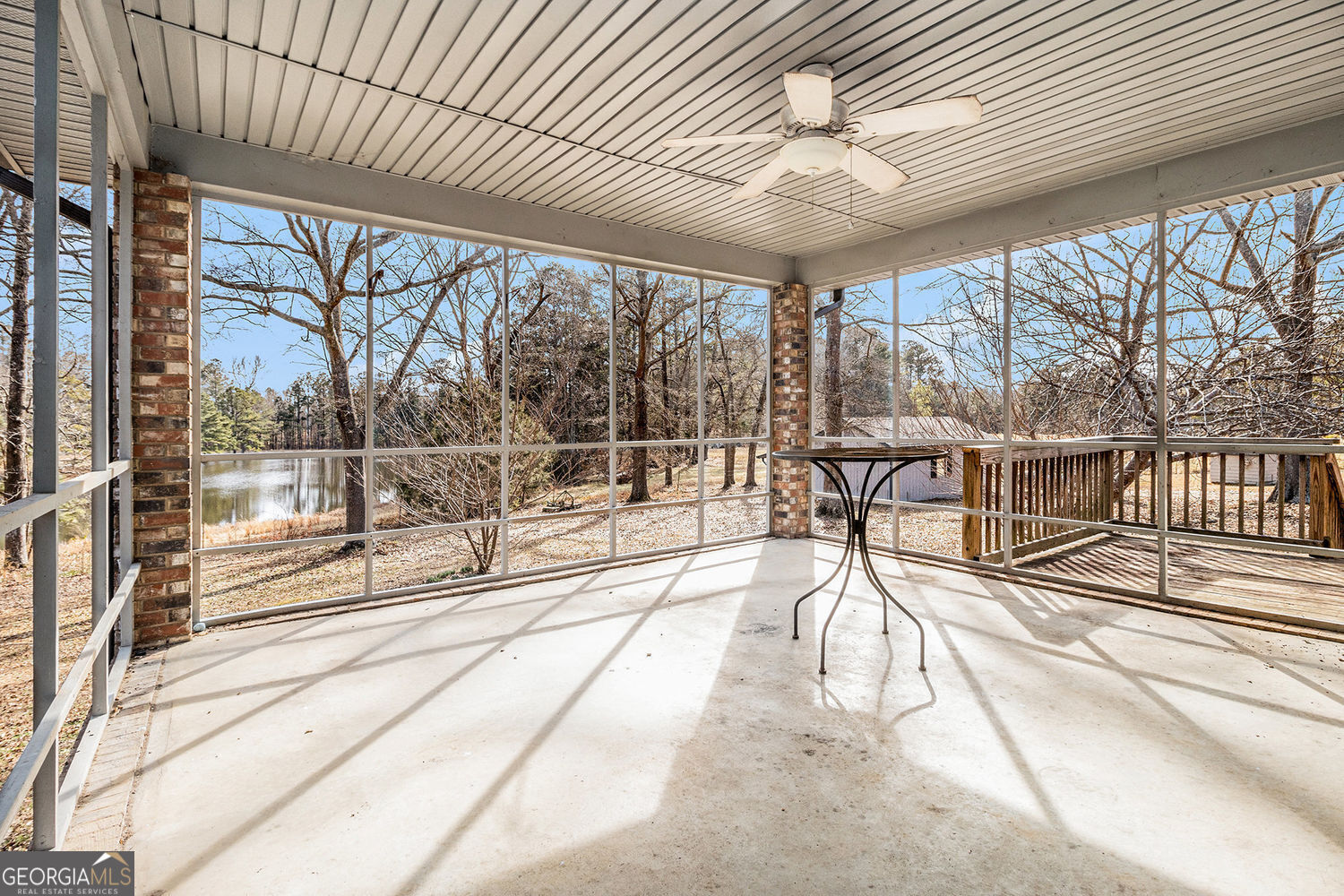 255 Barnett Road Hampton, GA 30228 - Photo 28 of 42 a view of a room with wooden floor and iron stairs