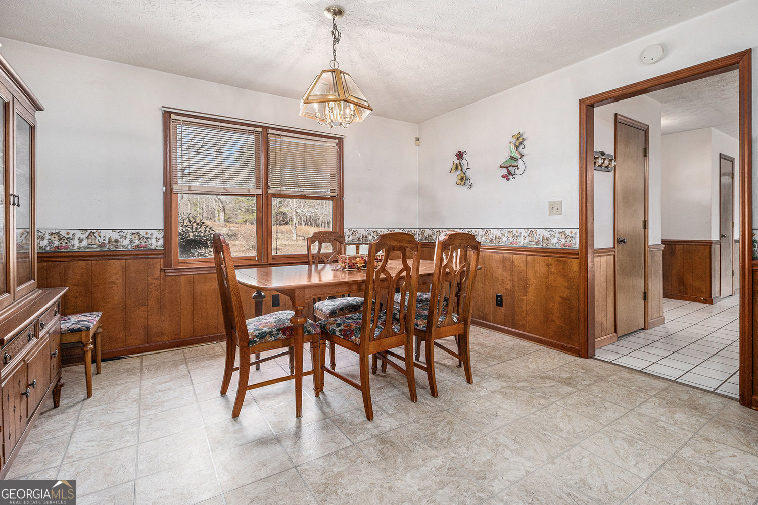 255 Barnett Road Hampton, GA 30228 - Photo 10 of 42 a view of a a dining room with furniture window and outside view