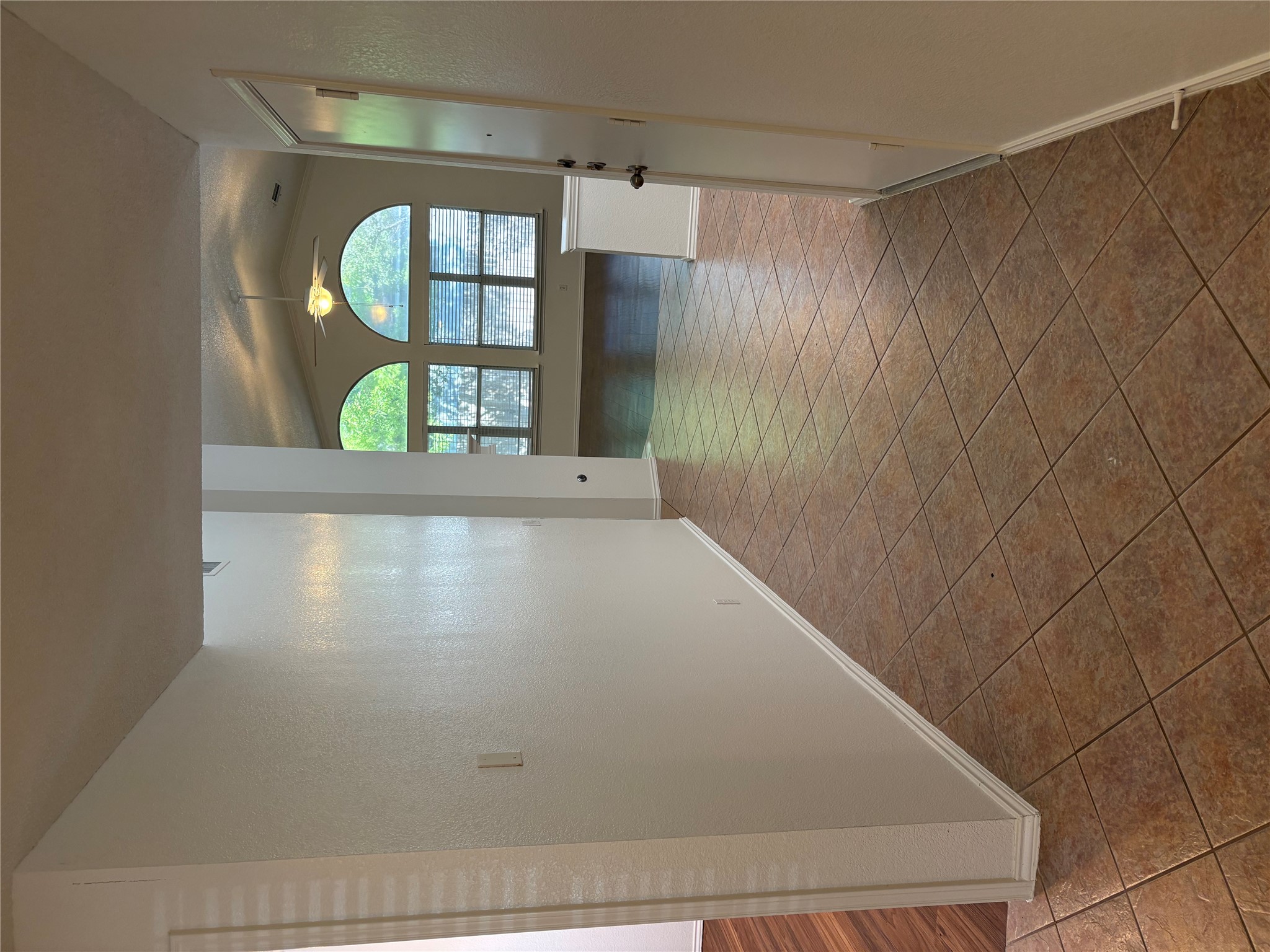 Front door opens to a large entry area with closet on the left