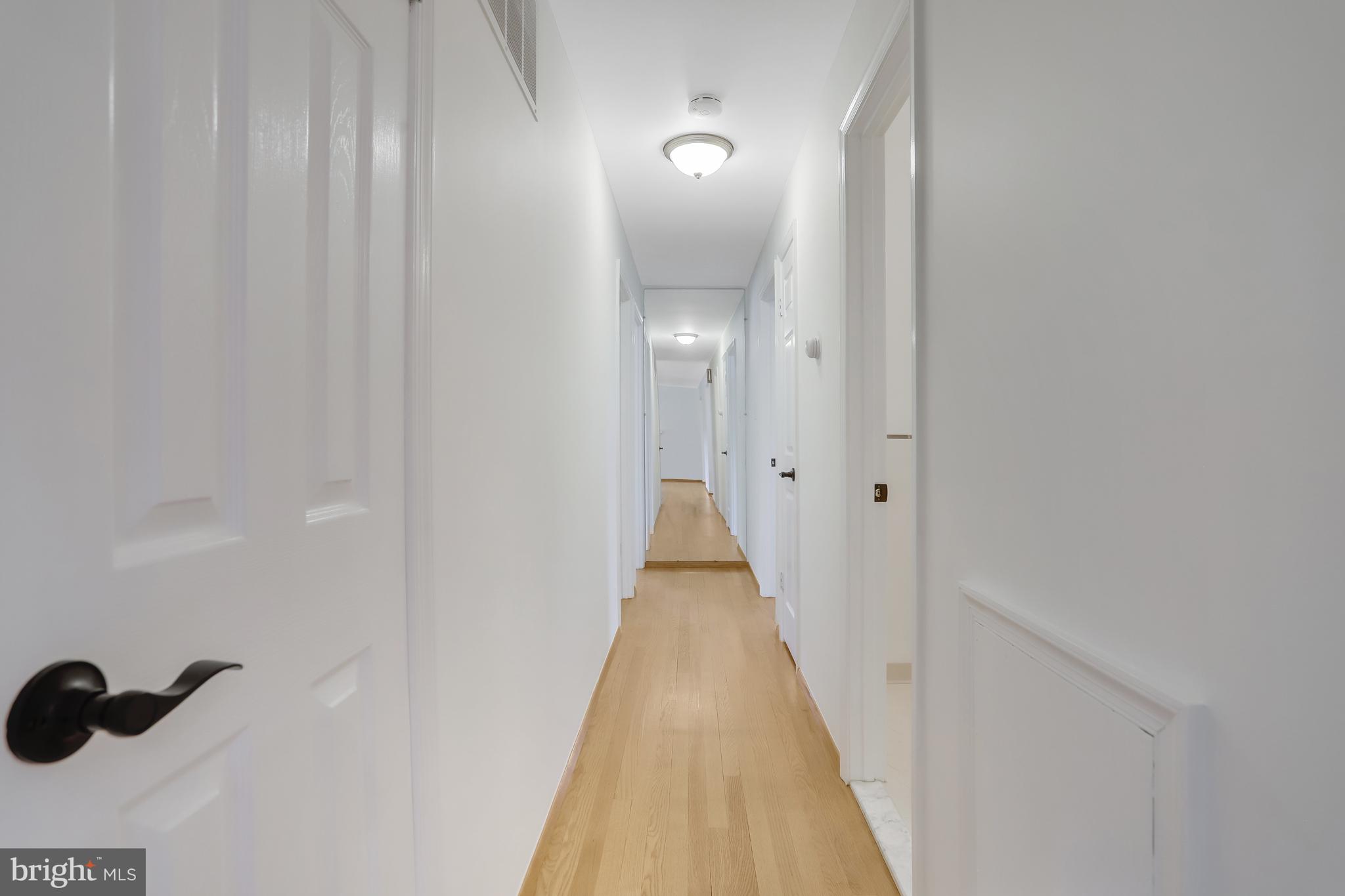 8305 Accotink Road Lorton, VA 22079 - Photo 24 of 73 Hallway to 3 of 5 bedrooms & 2 of 3 full bathrooms