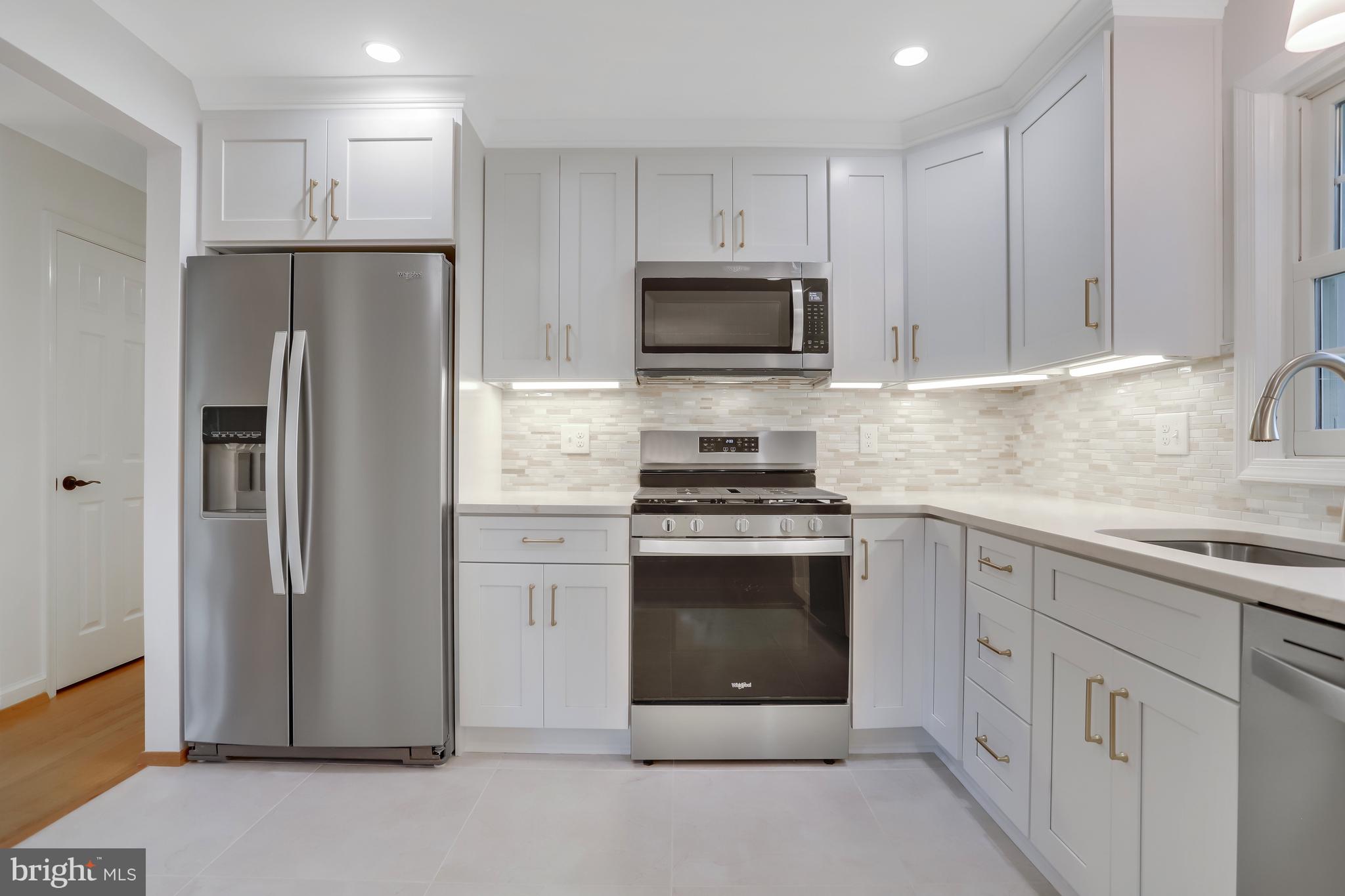 8305 Accotink Road Lorton, VA 22079 - Photo 8 of 73 New kitchen 2024
