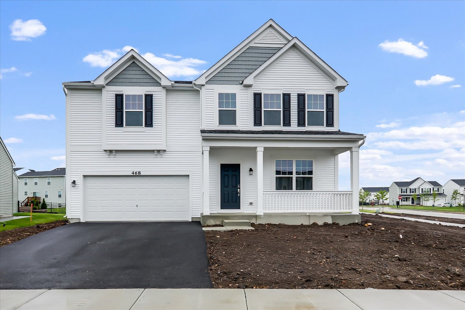 468 Endicott Road South Elgin, IL 60177 - Photo 1 of 32 a front view of a house with a yard and garage