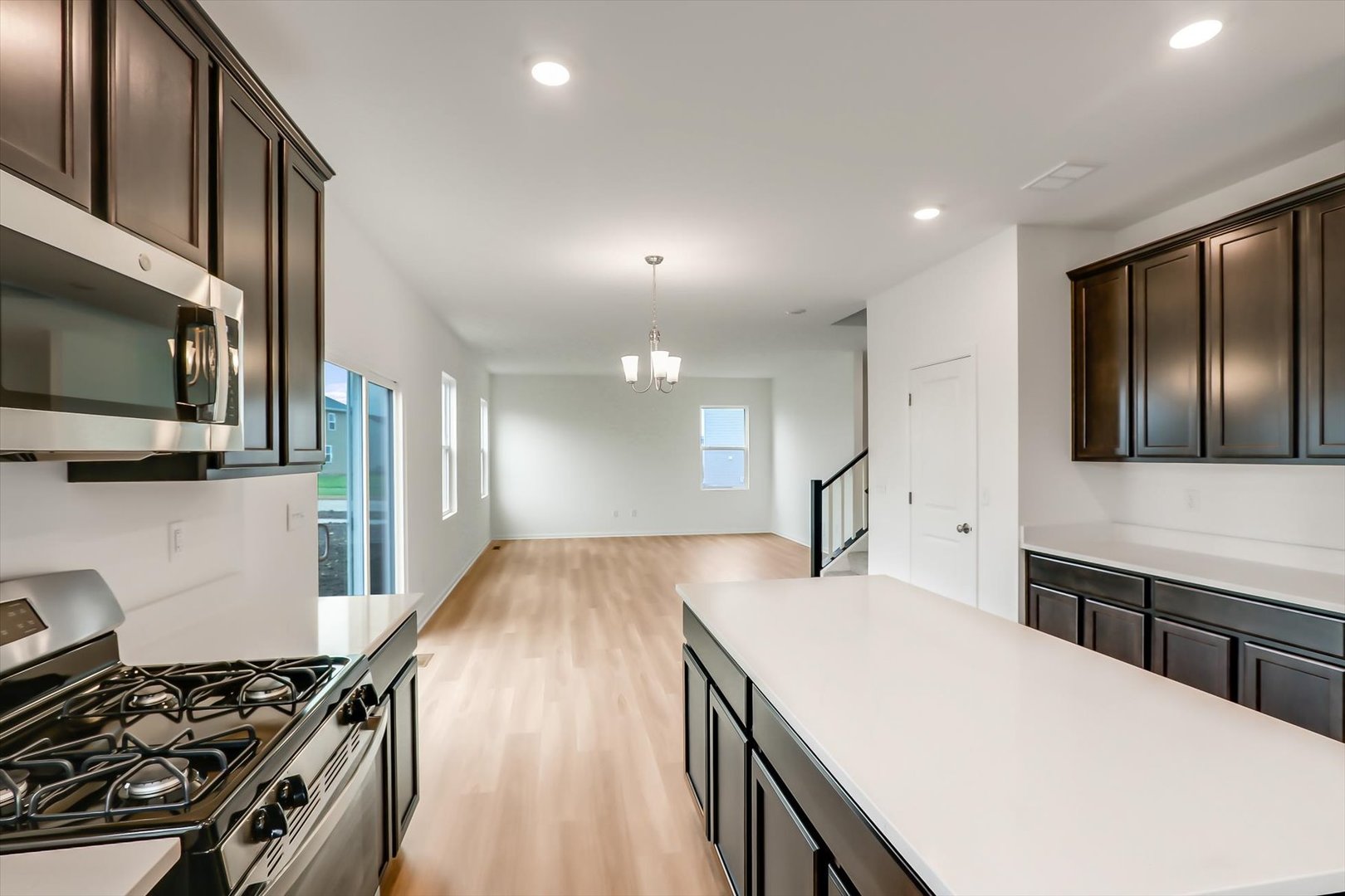 468 Endicott Road South Elgin, IL 60177 - Photo 12 of 32 a kitchen with stainless steel appliances a stove a sink a microwave a refrigerator and cabinets