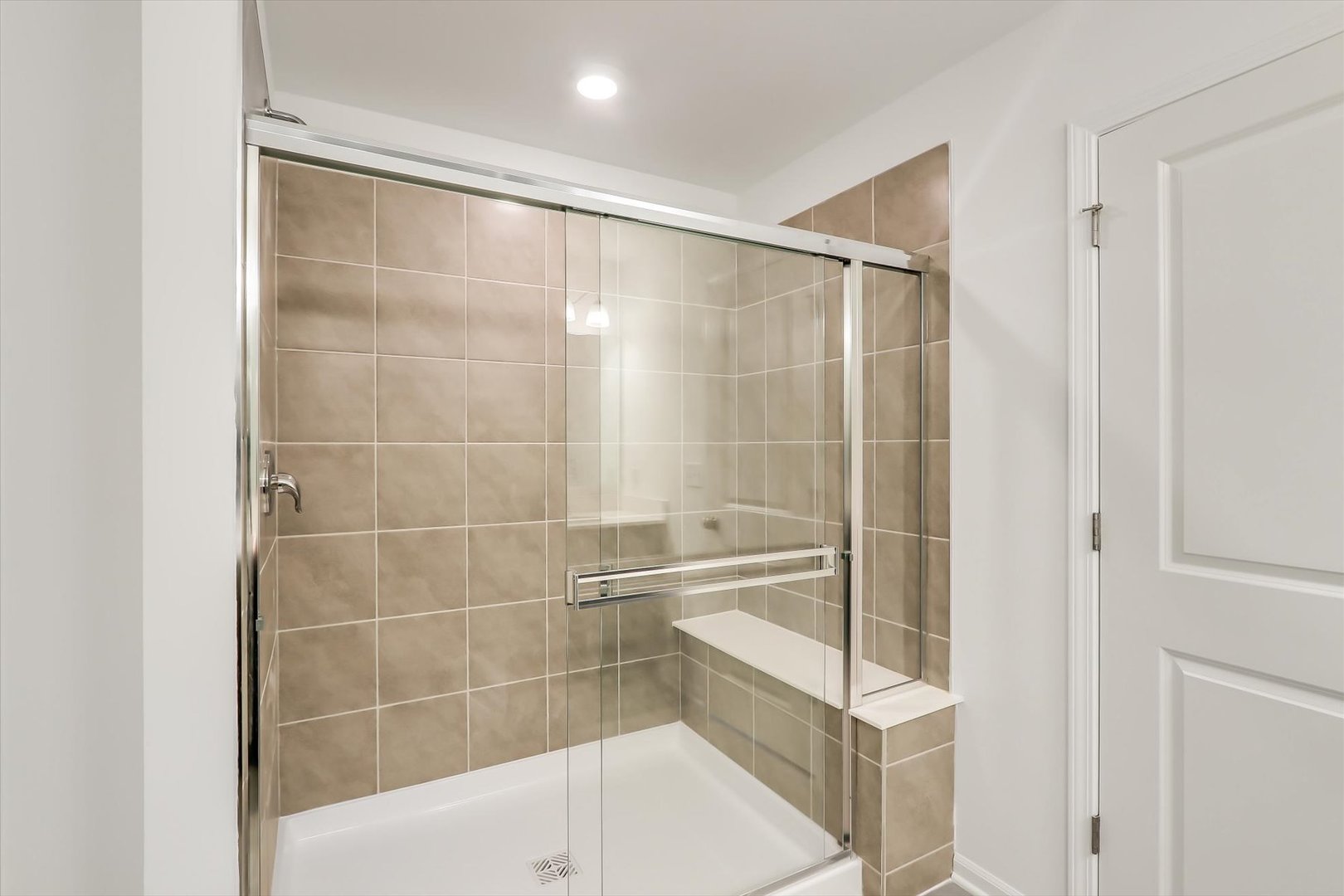 468 Endicott Road South Elgin, IL 60177 - Photo 24 of 32 a bathroom with a glass shower door