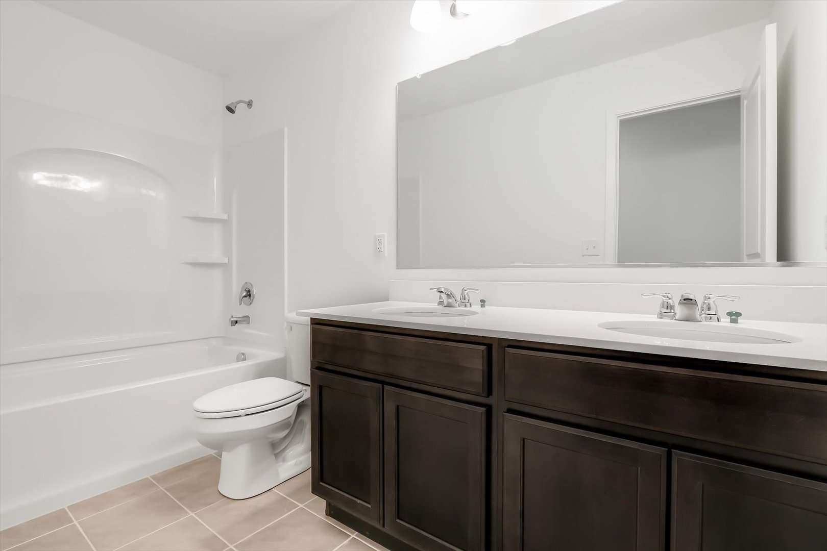 468 Endicott Road South Elgin, IL 60177 - Photo 26 of 32 a bathroom with a sink a toilet and shower