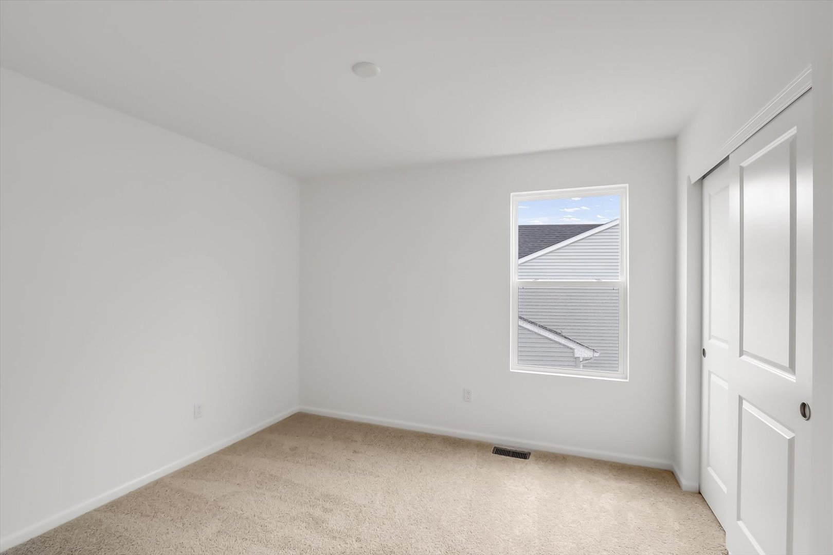 468 Endicott Road South Elgin, IL 60177 - Photo 27 of 32 an empty room with a window