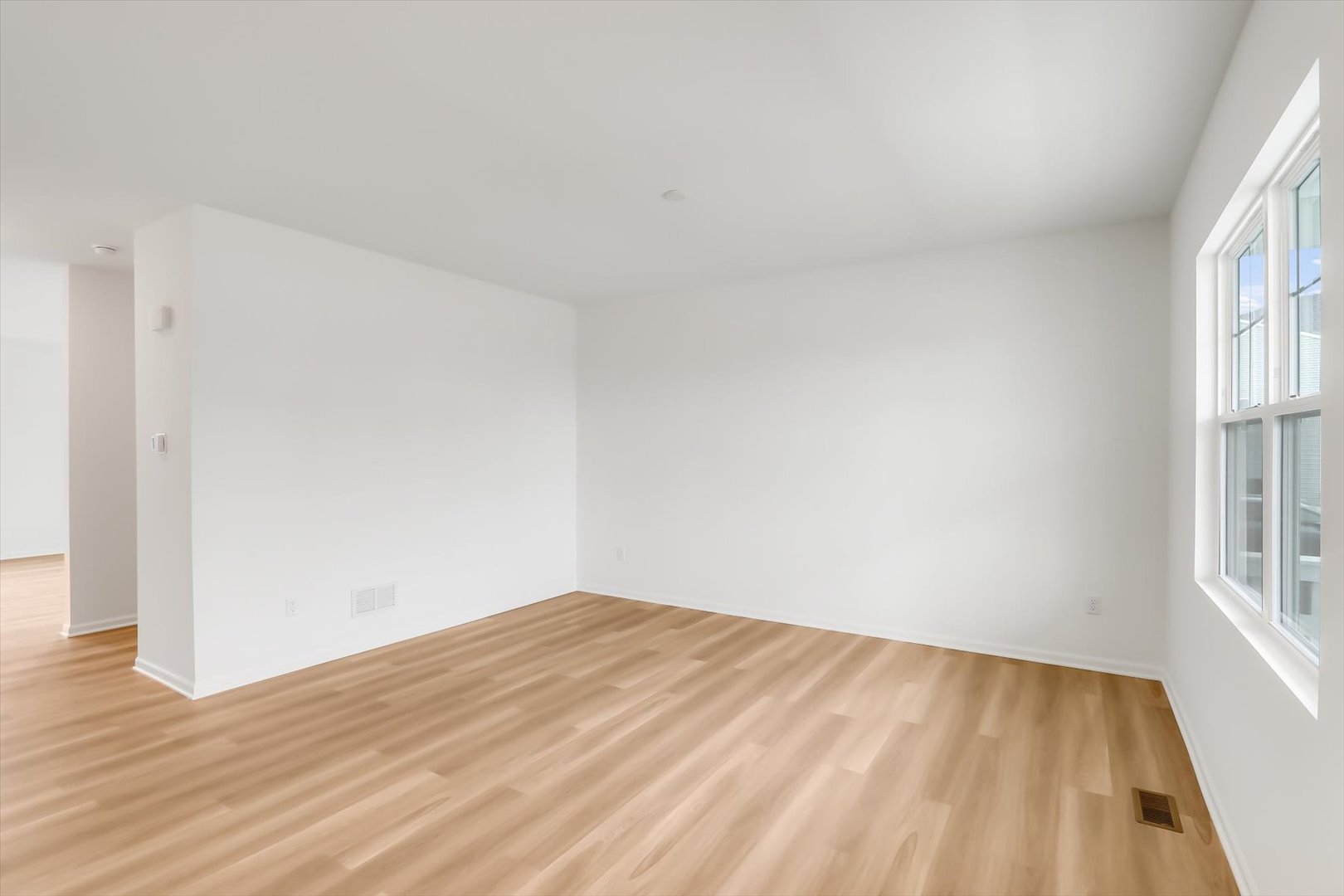 468 Endicott Road South Elgin, IL 60177 - Photo 4 of 32 a view of empty room with wooden floor and fan