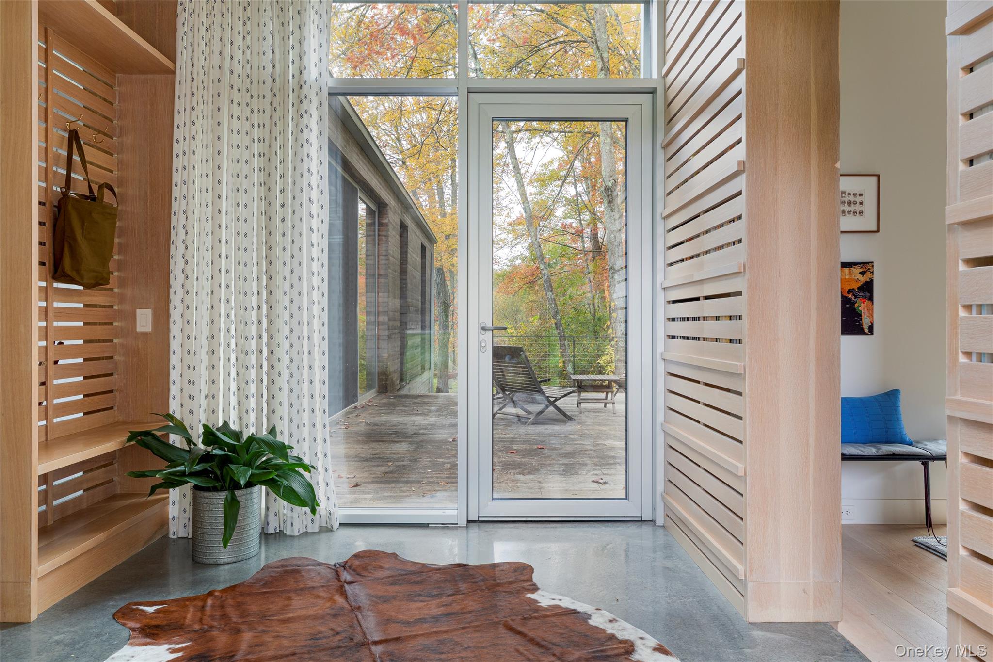 29 Drake Road Clinton Corners, NY 12514 - Photo 16 of 49 a living room with furniture and a potted plant