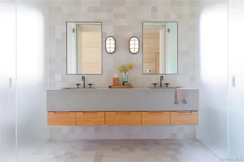 a bathroom with a bathtub and a sink