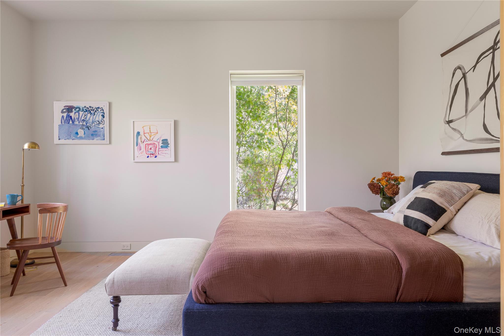 29 Drake Road Clinton Corners, NY 12514 - Photo 24 of 49 a bedroom with a bed and chair