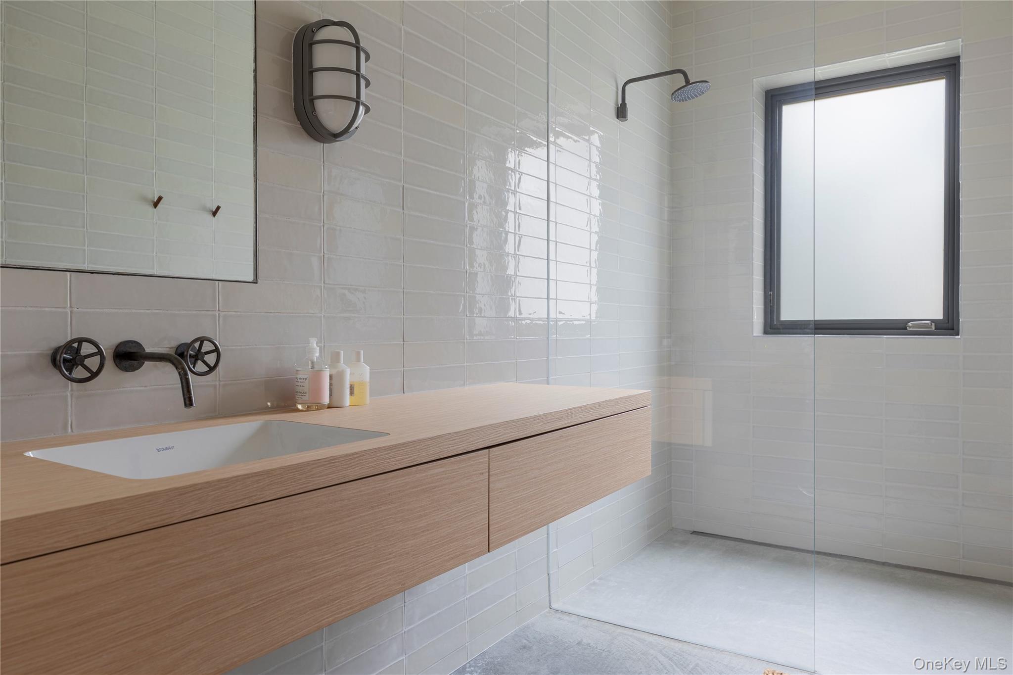 29 Drake Road Clinton Corners, NY 12514 - Photo 44 of 49 a bathroom with a sink and a mirror