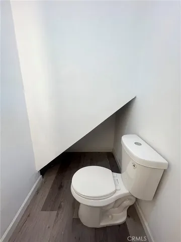 a bathroom with a toilet and a sink