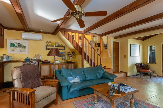 a bathroom with a sink mirror and a bathtub