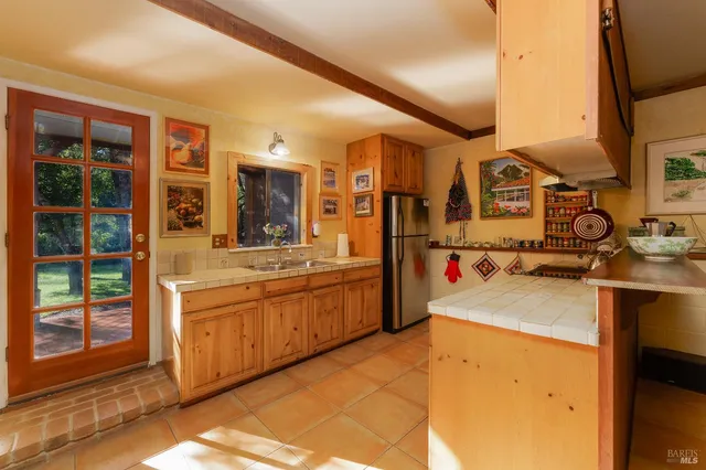 a bathroom with a sink a toilet and bathtub