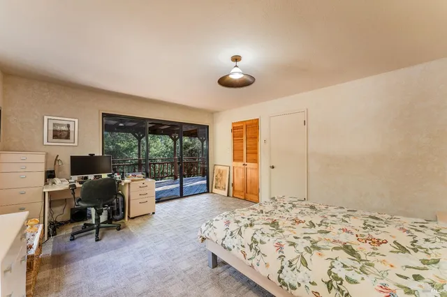 a view of outdoor space with wooden floor