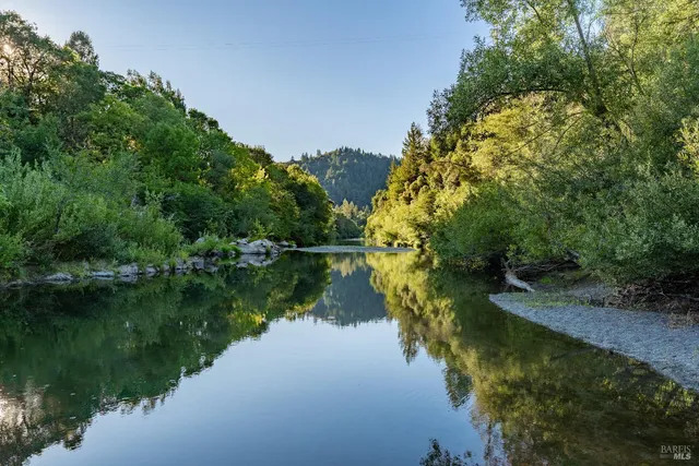 a view of lake with green space