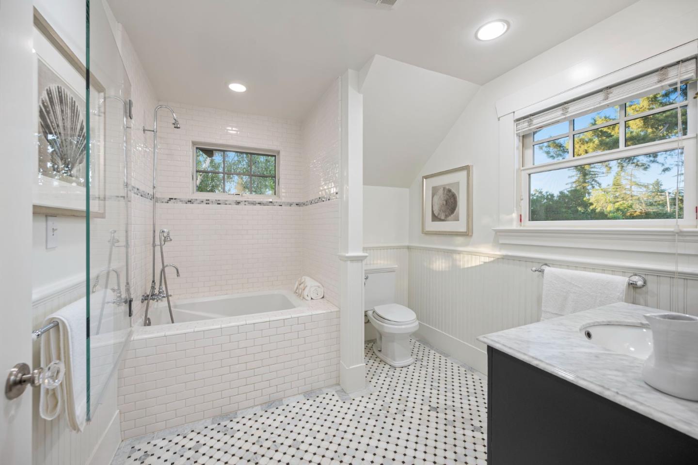 445 Arlington Road Redwood City, CA 94062 - Photo 20 of 50 a bathroom with a sink a toilet and bathtub