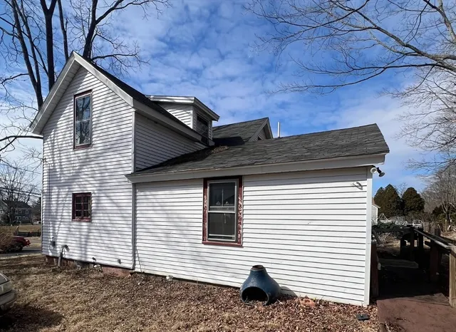 a house view with a backyard