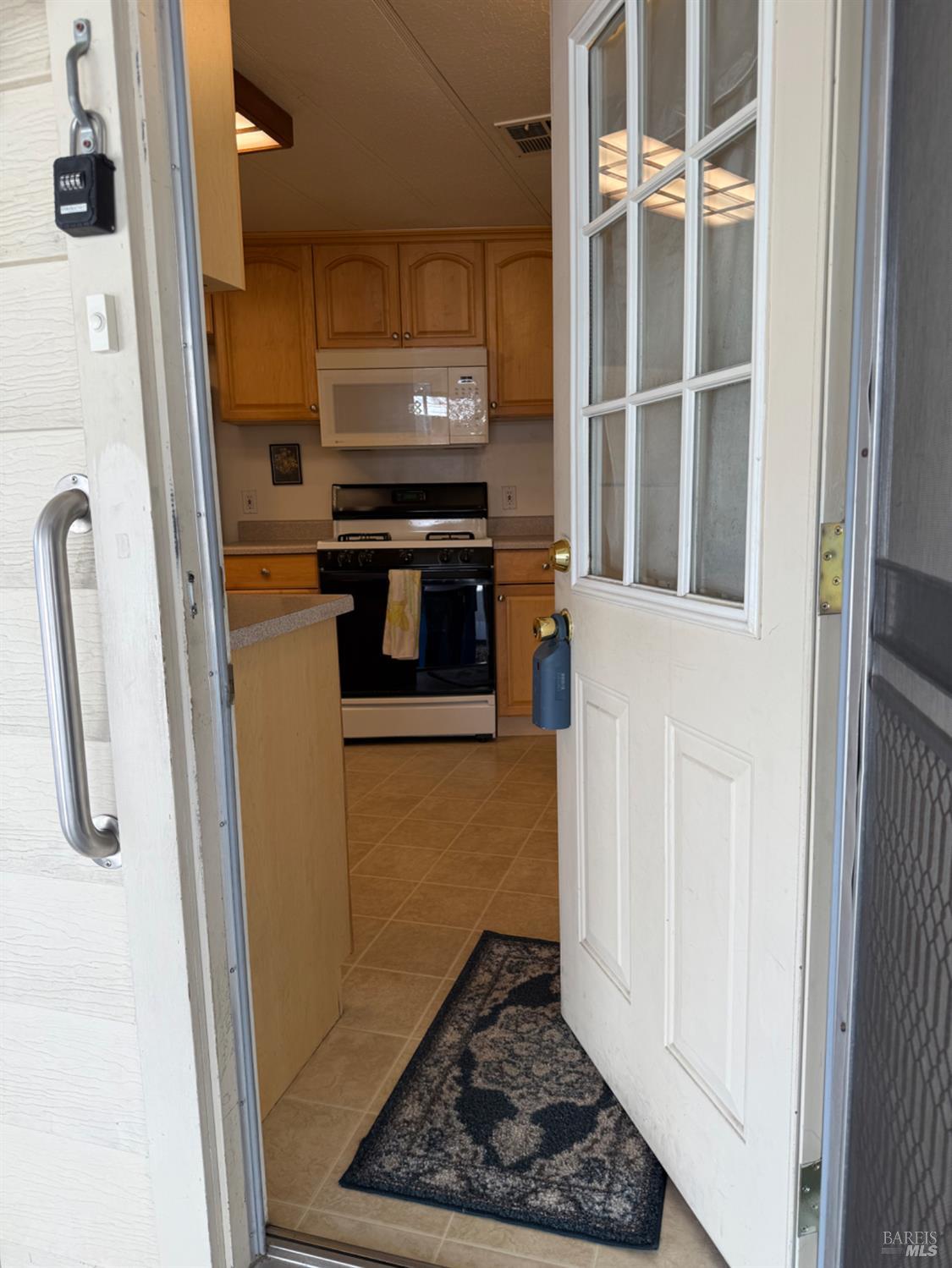 82 Charro Drive Santa Rosa, CA 95401 - Photo 3 of 22 Entrance from driveway under carport.