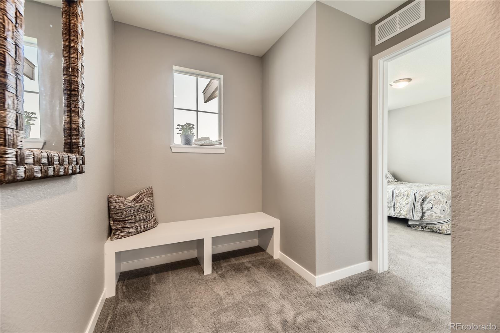 1182 Williams Loop Elizabeth, CO 80107 - Photo 24 of 42 a bedroom with a bed and a window