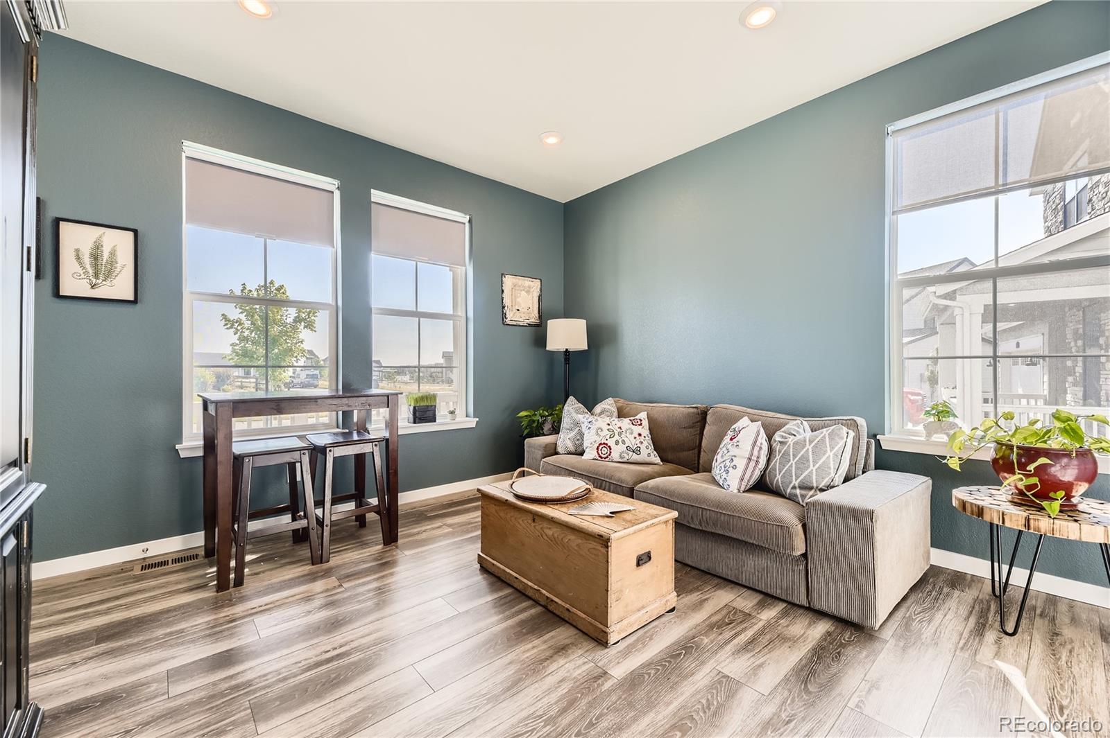 1182 Williams Loop Elizabeth, CO 80107 - Photo 26 of 42 a living room with furniture and a large window