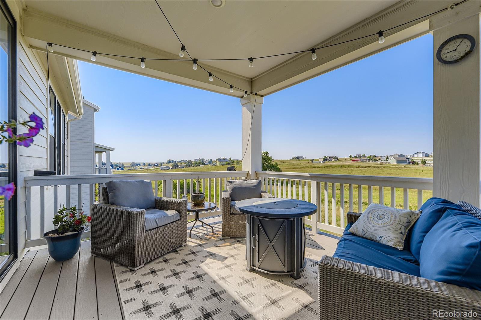 1182 Williams Loop Elizabeth, CO 80107 - Photo 31 of 42 a view of a balcony with furniture