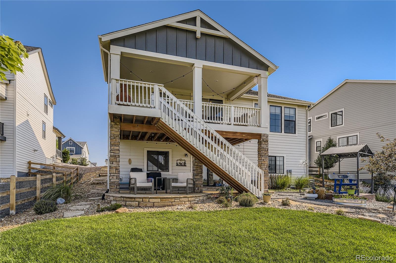 1182 Williams Loop Elizabeth, CO 80107 - Photo 36 of 42 a front view of a house with a yard