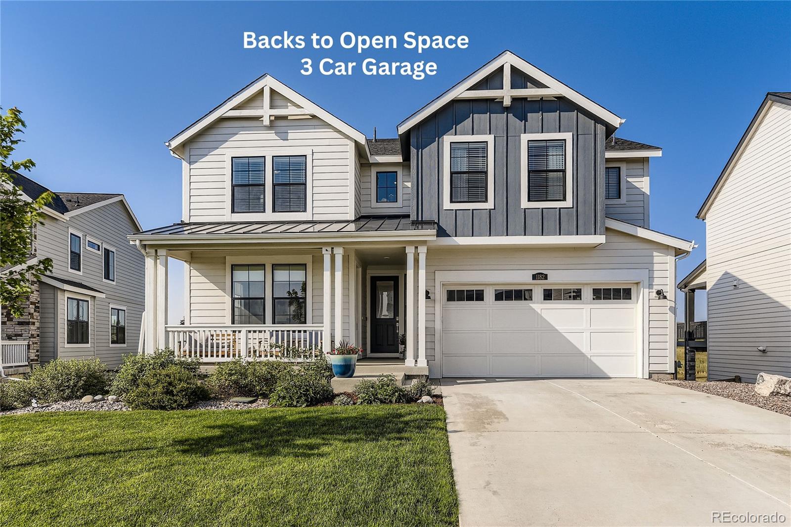 1182 Williams Loop Elizabeth, CO 80107 - Photo 5 of 42 a front view of a house with a yard and garage