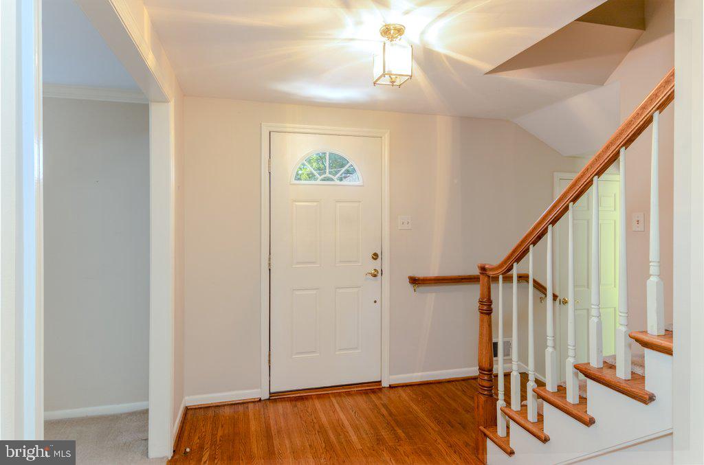 324 Wayland Road Cherry Hill, NJ 08034 - Photo 5 of 28 a view of front door and wooden floor