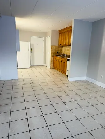 a view of an empty room and window