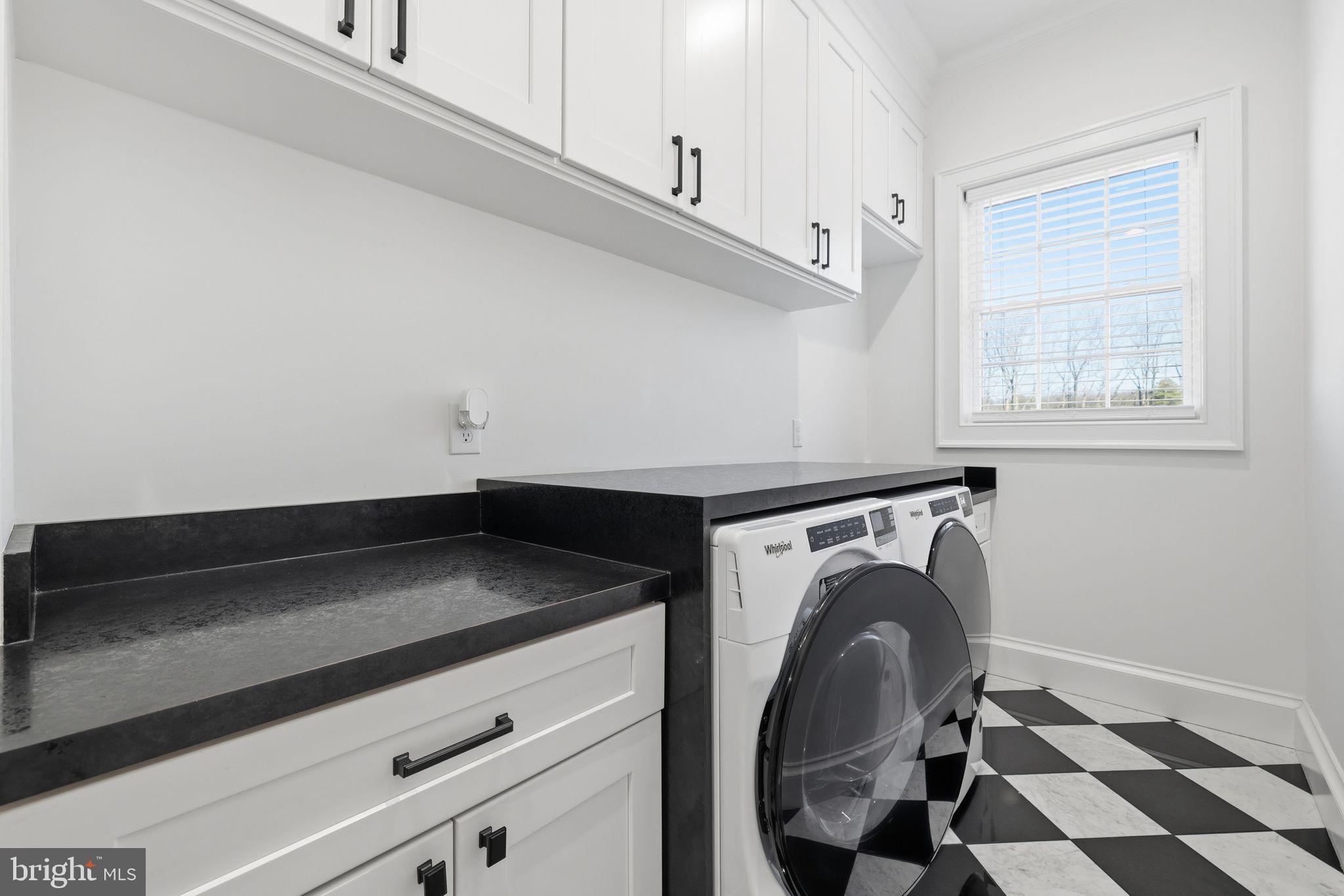 306 Shore Lane Milford, DE 19963 - Photo 15 of 38 a utility room with dryer and washer