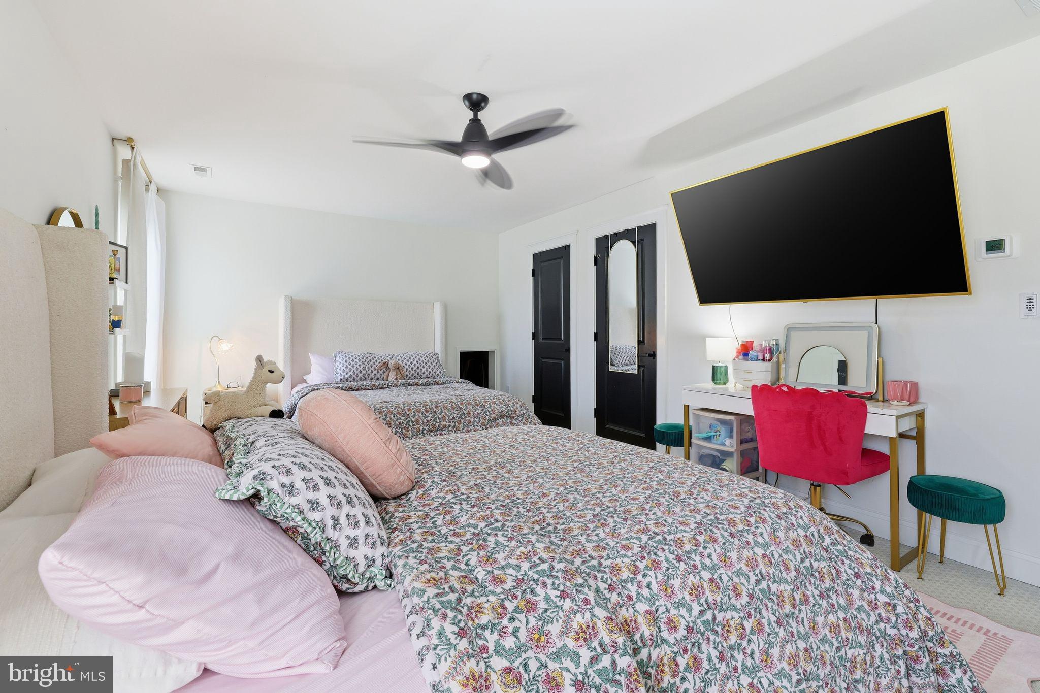 306 Shore Lane Milford, DE 19963 - Photo 23 of 38 a bedroom with a bed and a flat screen tv