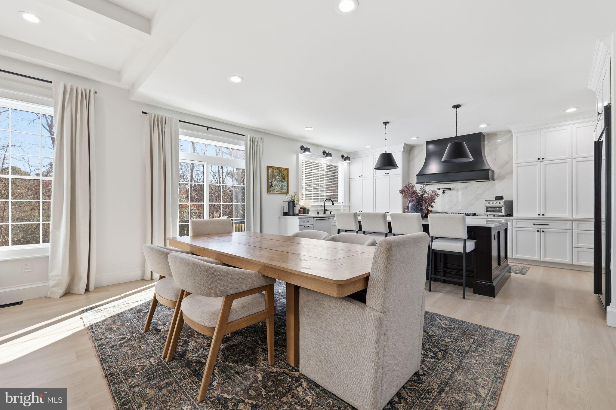 306 Shore Lane Milford, DE 19963 - Photo 9 of 38 a kitchen with stainless steel appliances kitchen island granite countertop a sink and cabinets