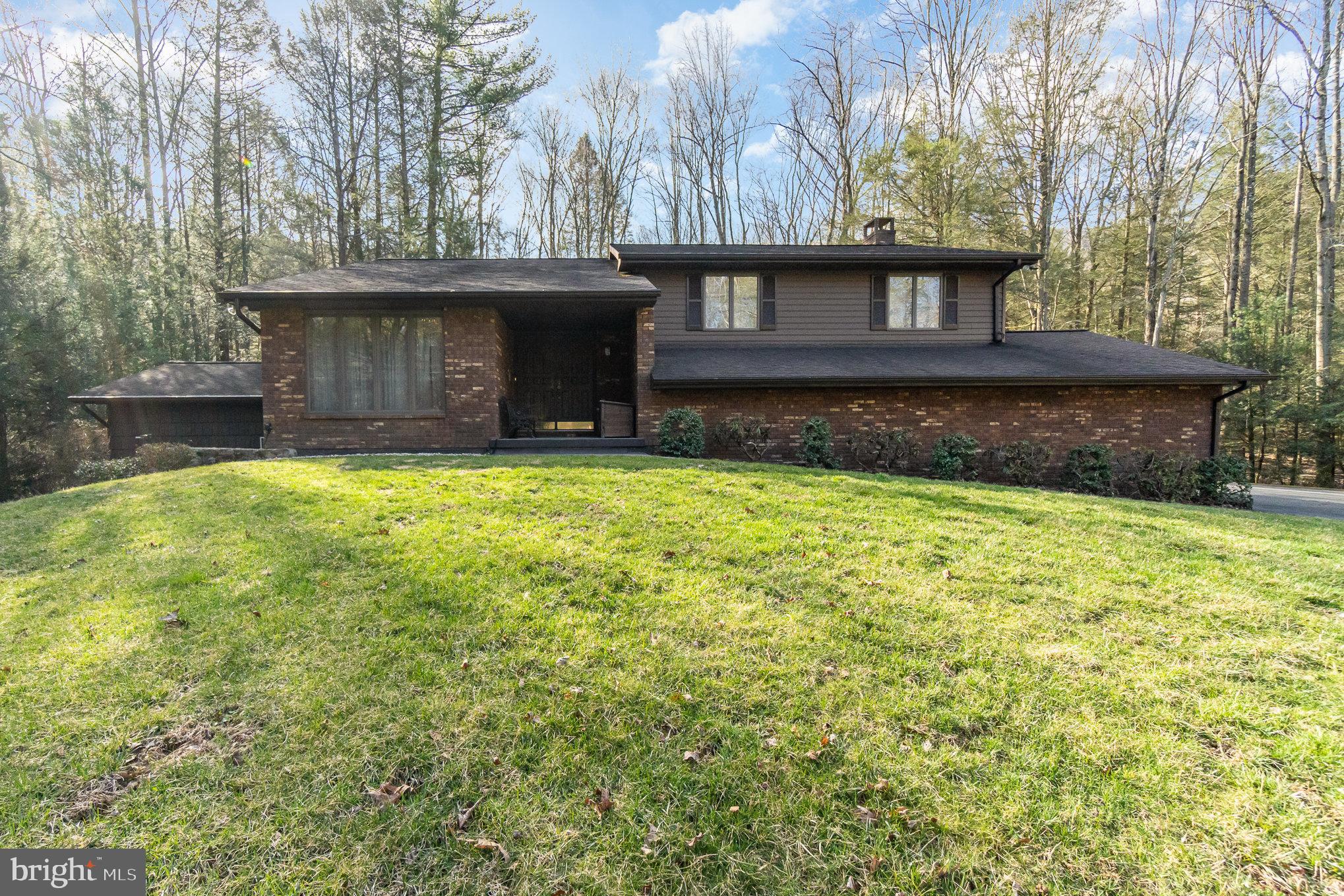 48 Turnpike Road Ashland, PA 17921 - Photo 2 of 60 a view of a house with pool and a yard