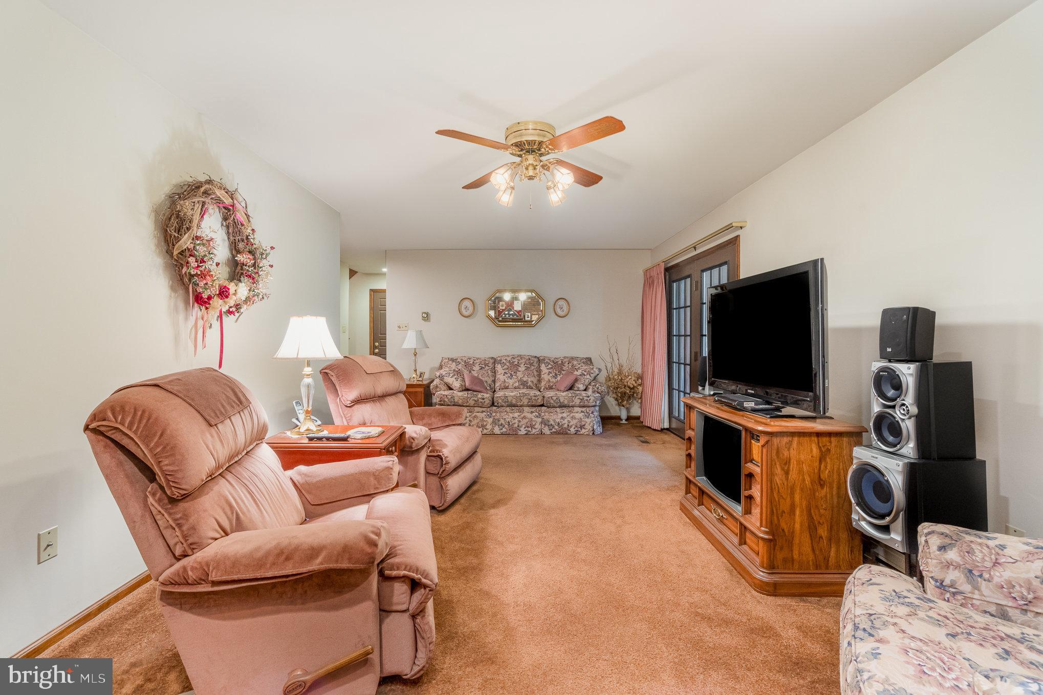 48 Turnpike Road Ashland, PA 17921 - Photo 24 of 60 a living room with furniture and a flat screen tv