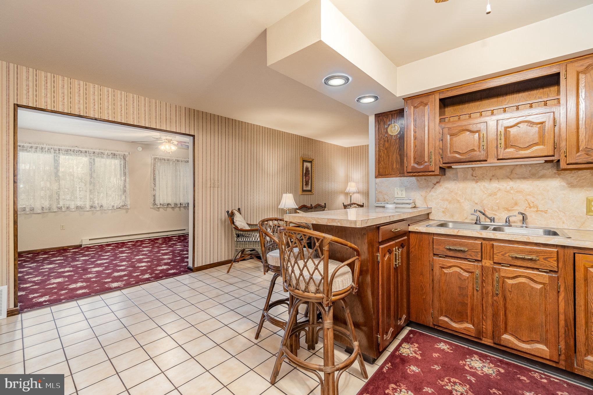 48 Turnpike Road Ashland, PA 17921 - Photo 29 of 60 a kitchen with stainless steel appliances granite countertop a sink and cabinets