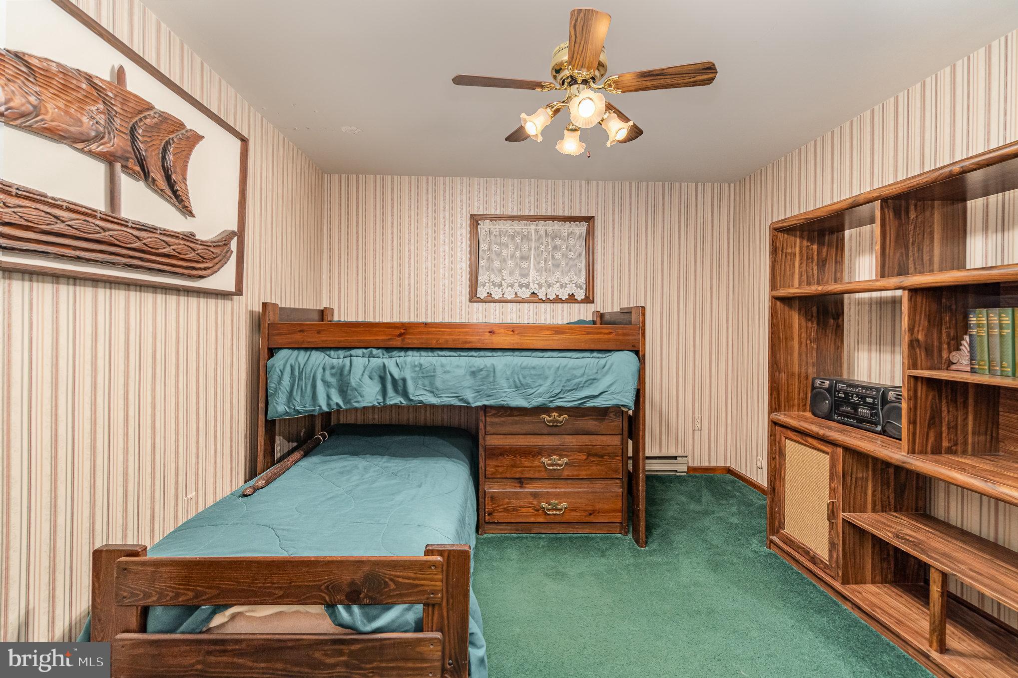 48 Turnpike Road Ashland, PA 17921 - Photo 35 of 60 a room with furniture and a book shelf