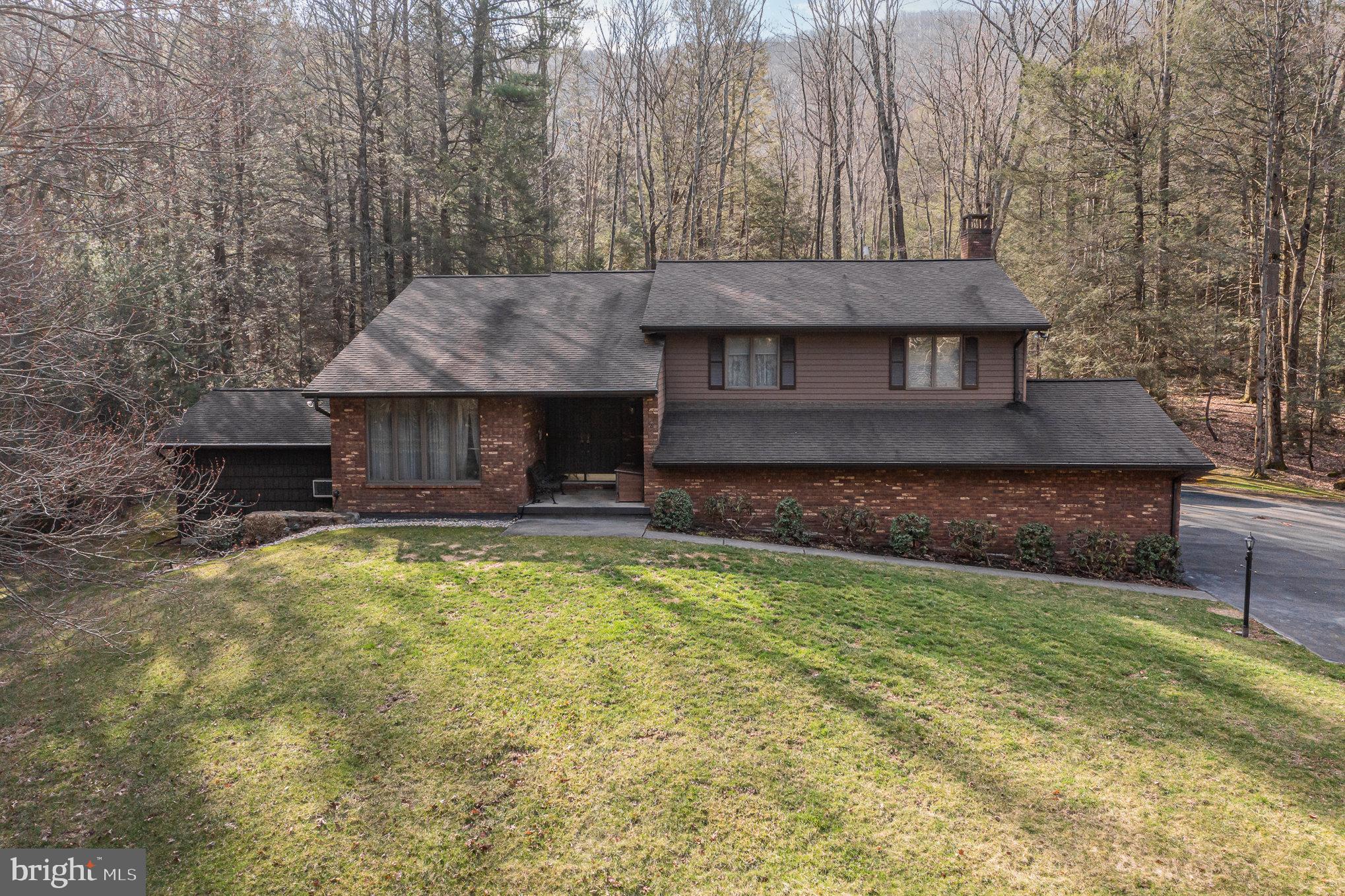 48 Turnpike Road Ashland, PA 17921 - Photo 47 of 60 a front view of a house with a yard