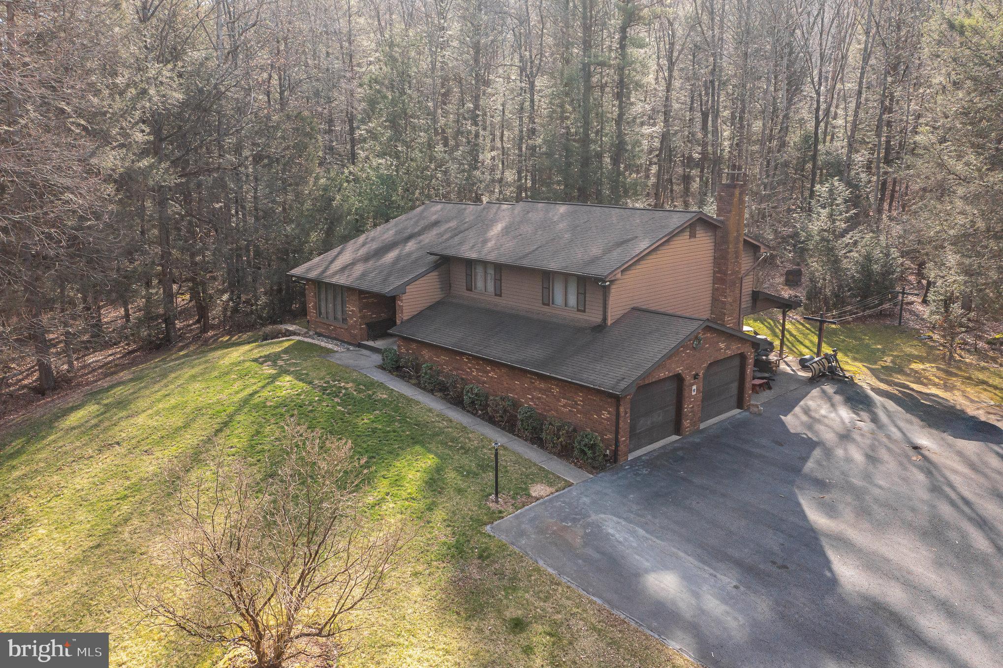 48 Turnpike Road Ashland, PA 17921 - Photo 48 of 60 a view of a swimming pool with a yard